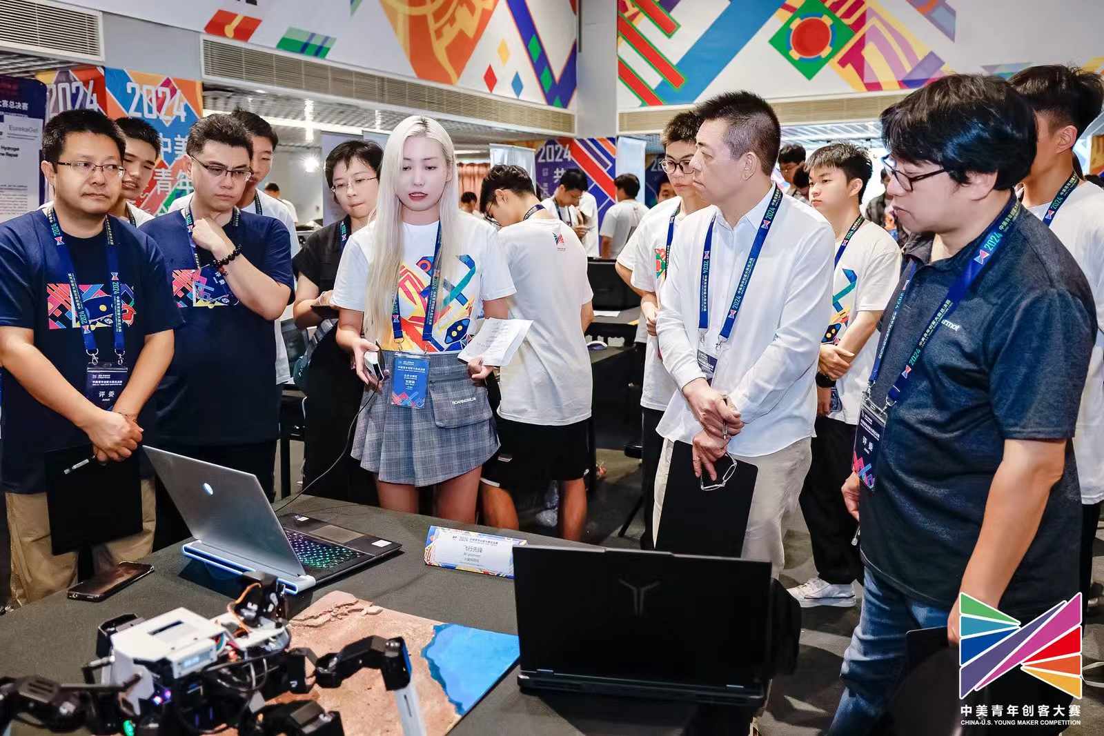 Team-built quadruped exploration robot demonstrated at the China-U.S. Young Maker Competition