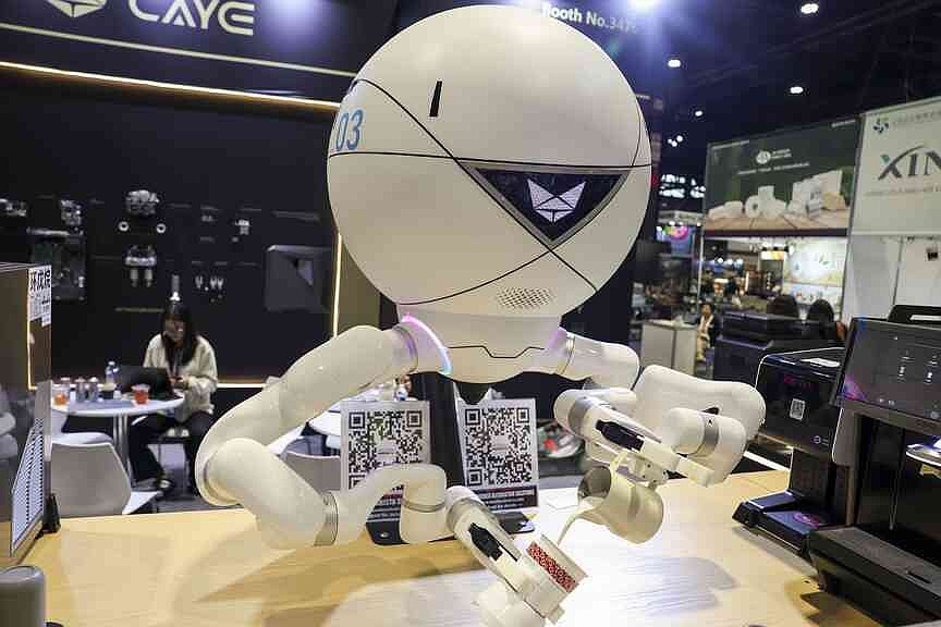 Orbista dual-arm service robot preparing coffee at the National Restaurant Association Show