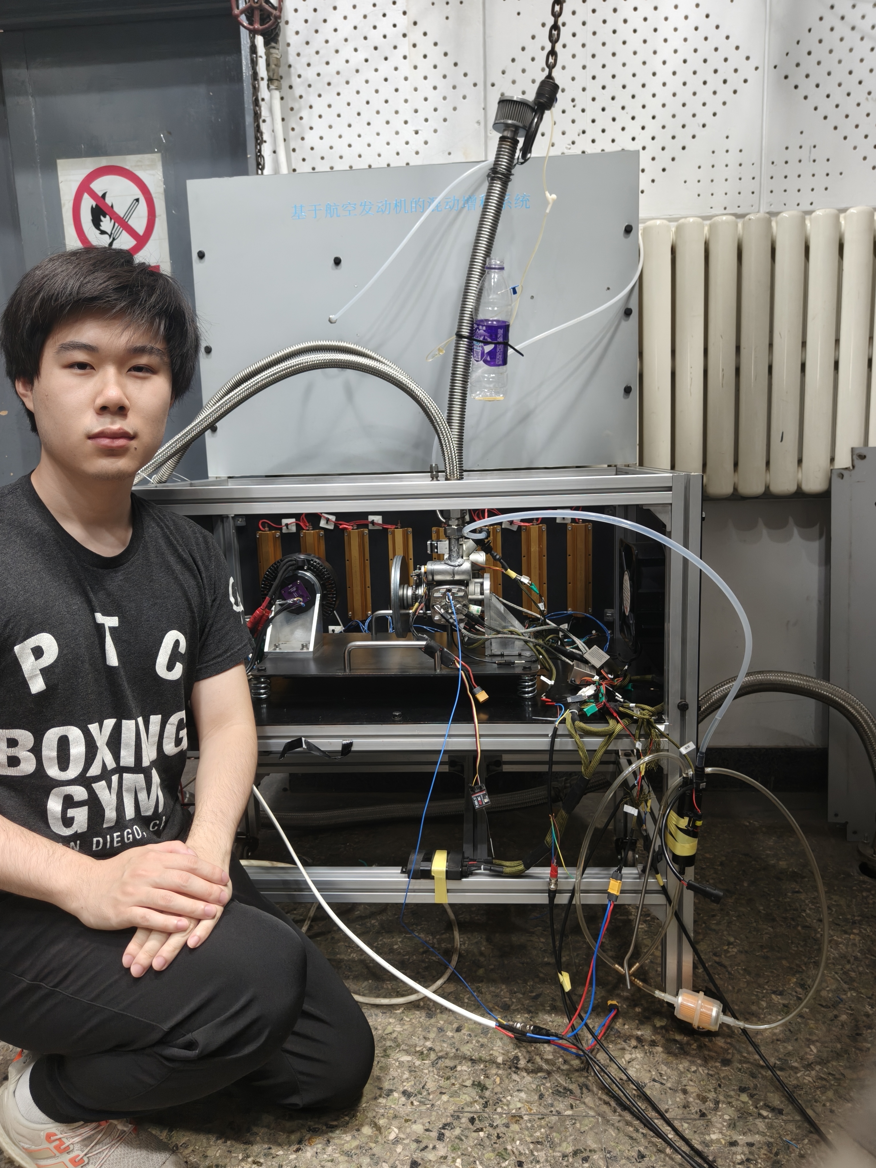 Me beside the instrumented GTT70 ammonia engine test bench